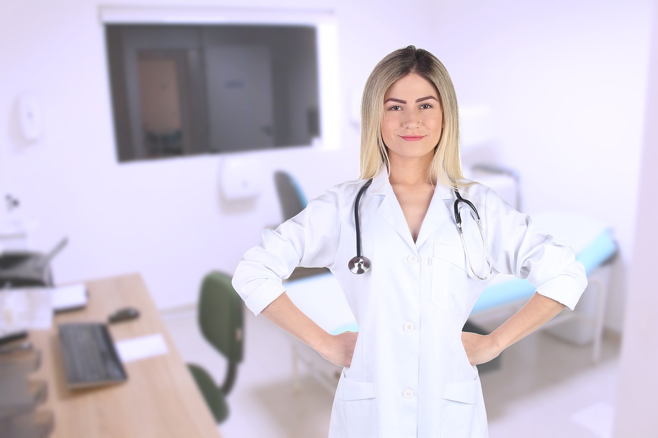 young woman doctor standing in office
